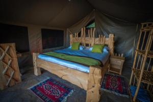 Postel nebo postele na pokoji v ubytování Kivuko Eco Camp
