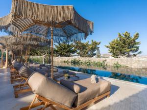Bazén v ubytovaní Asty Mykonos Hotel & Spa - World of One Hotel Group alebo v jeho blízkosti