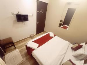 TV a/nebo společenská místnost v ubytování Hotel Marys Arcade