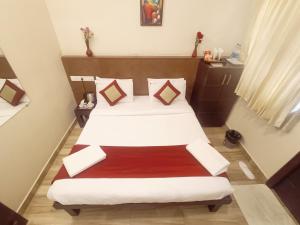 Postel nebo postele na pokoji v ubytování Hotel Marys Arcade