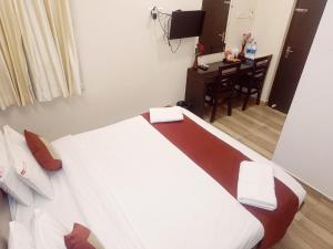 Postel nebo postele na pokoji v ubytování Hotel Marys Arcade