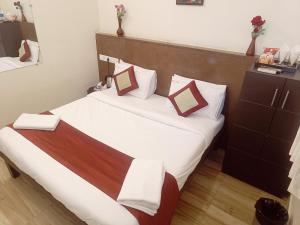 Postel nebo postele na pokoji v ubytování Hotel Marys Arcade