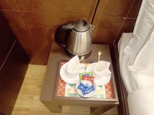 Příslušenství pro přípravu čaje a kávy v ubytování Hotel Marys Arcade