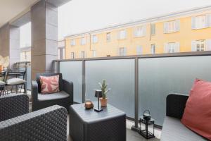 A seating area at Luxury apt in Moscova (Gym+parking+private office)