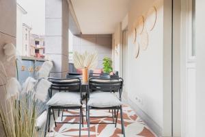 A seating area at Luxury apt in Moscova (Gym+parking+private office)