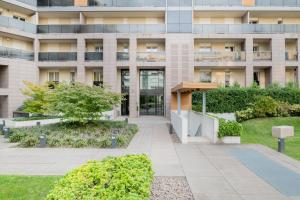 A garden outside Luxury apt in Moscova (Gym+parking+private office)