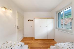 Postel nebo postele na pokoji v ubytování Apartment Weingut Zail