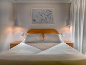 Posteľ alebo postele v izbe v ubytovaní H10 Ocean Suites