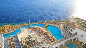 Bazén v ubytování Reef Oasis Blue Bay Resort & Spa nebo v jeho okolí