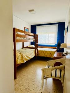 Postel nebo postele na pokoji v ubytování Muy cerca del mar, dos habitaciones + 14 fotografií