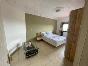 NongoAppartement spacieux à Nongo,UNC的相册照片