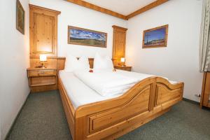 Ein Bett oder Betten in einem Zimmer der Unterkunft Untersulzberghof