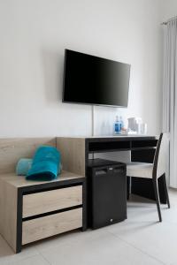 TV a/nebo společenská místnost v ubytování Hotel Médano