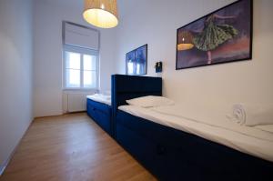 Posteľ alebo postele v izbe v ubytovaní Charming Historical Apartments Near City Centre