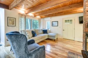 a living room with a couch and chairs at North Conway Vacation Rental Near Saco River! in North Conway