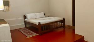 Ένα ή περισσότερα κρεβάτια σε δωμάτιο στο Cuppa Creek Homestay