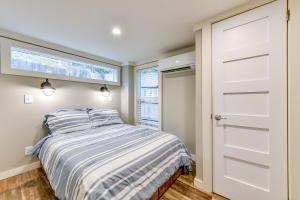 a small bedroom with a bed and a window at Lake Norman Getaway with Pool Access and Kayaking! in Terrell +22 photos