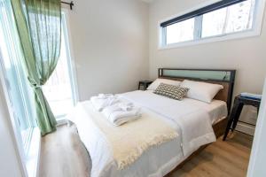 Postel nebo postele na pokoji v ubytování Prime Hill Escape Lodge- Près de Tremblant