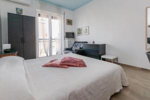 Posteľ alebo postele v izbe v ubytovaní Appartamento 3 camere milano centro + 20 fotografií
