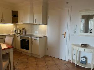 Kuchyň nebo kuchyňský kout v ubytování Haus Ankerlicht Wohnung 61