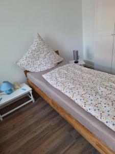 Postel nebo postele na pokoji v ubytování Brigg