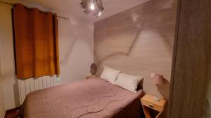 Postel nebo postele na pokoji v ubytování Apartamentos Grifo Vacances Grizzly