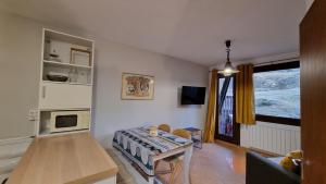 Kuchyň nebo kuchyňský kout v ubytování Apartamentos Grifo Vacances Grizzly