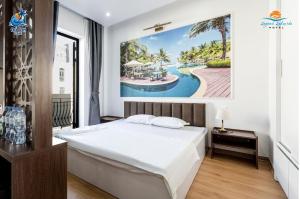 Ένα ή περισσότερα κρεβάτια σε δωμάτιο στο Legend Lakeside Hotel