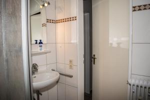 Koupelna v ubytování Ferienwohnung Bäumer Borkum - Nichtraucher & allergikerfreundlich + 9 fotografií