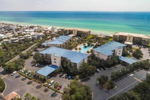 an aerial view of a resort with a pool and the ocean at Seacrest - Beach Blessing in Panama City Beach