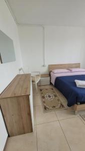 Postel nebo postele na pokoji v ubytování Corte Azzurra Iris