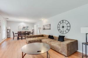 a living room with a couch and a table at 7 Acres Secluded Private Estate Sleeps 16 in Conyers