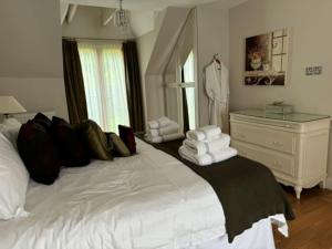 Ένα ή περισσότερα κρεβάτια σε δωμάτιο στο The Wee Cosy Nook