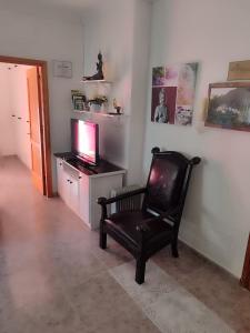 TV a/nebo společenská místnost v ubytování Casa Reyes Fataga