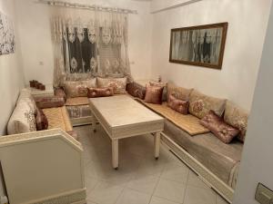 Posezení v ubytování Appartement OUJDA Résidence ALGHAYT 1