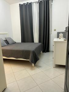 Postel nebo postele na pokoji v ubytování Appartement OUJDA Résidence ALGHAYT 1