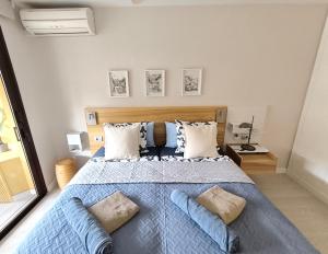 Postel nebo postele na pokoji v ubytování OLIVIA SUNSET BLISS - AC, fibre net, large pool, La Gomera and ocean view + 28 fotografií