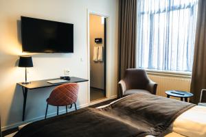 Sjónvarps- og/eða afþreyingartæki á Struer Grand Hotel