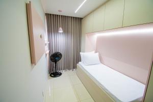 Ένα ή περισσότερα κρεβάτια σε δωμάτιο στο Apartamento maravilhoso 2 +67 φωτογραφίες