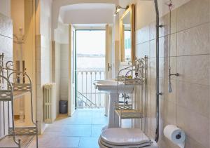 Koupelna v ubytování Casa Riscatto Suite + 27 fotografií