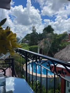 Piscina a Casa Xu´unan o a prop