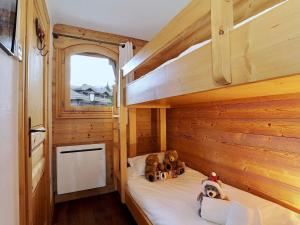 a bunk bed in a tiny house with stuffed animals on it at Charmant duplex 6 pers avec cheminée et garage à Courchevel - FR-1-575-194 in Courchevel