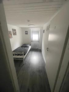 Postel nebo postele na pokoji v ubytování 8 Personen Appartment Bad Rappenau
