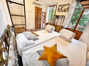 Postel nebo postele na pokoji v ubytování ECO Hostel