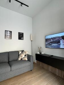 TV a/nebo společenská místnost v ubytování 48 Cadorna - Sostify