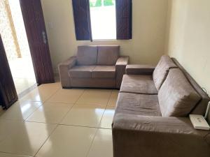 Posezení v ubytování Casa de praia , Condominio planeta agua