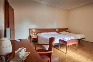 Postel nebo postele na pokoji v ubytování Sottoassisi - Guest House