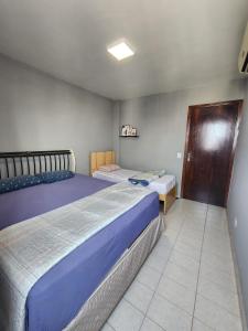 Postel nebo postele na pokoji v ubytování 1102 Apto Inteiro - Área Central