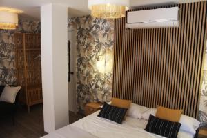 Postel nebo postele na pokoji v ubytování Casa la Siësta Albir