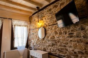 TV a/nebo společenská místnost v ubytování Leontis